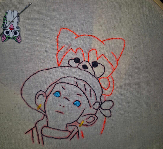 An embroidery of someone's final fantasy 14 character and their red panda