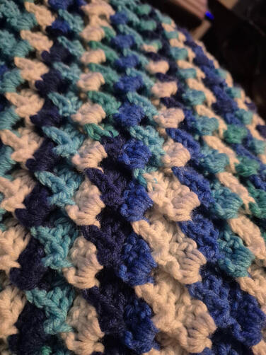 An up close image of the Tanjiro Water Breathing 3rd form blanket